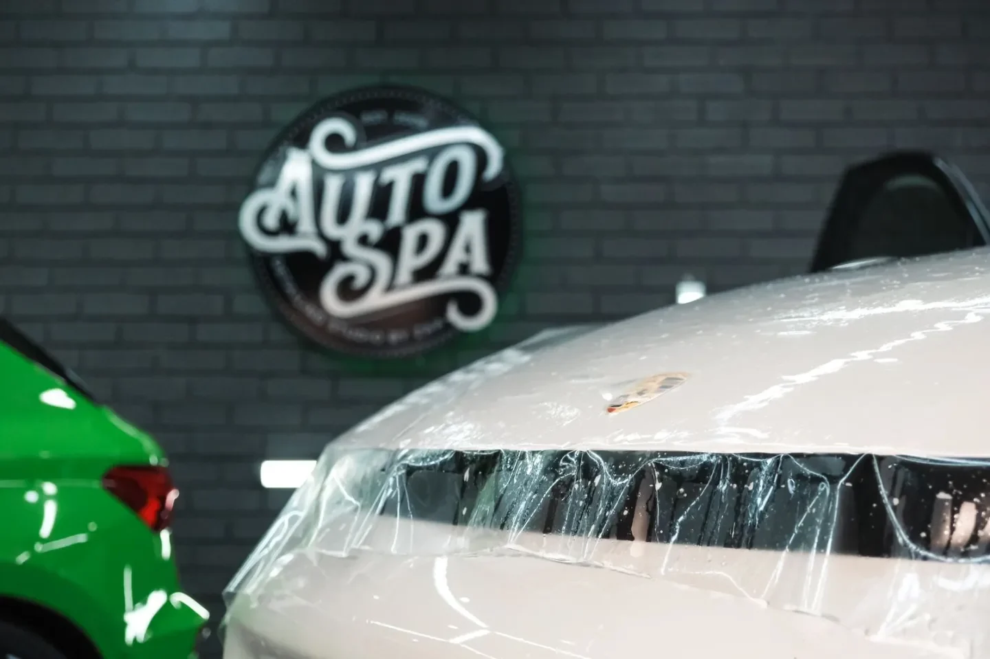 Close-up of clear film during a white BMW installation
