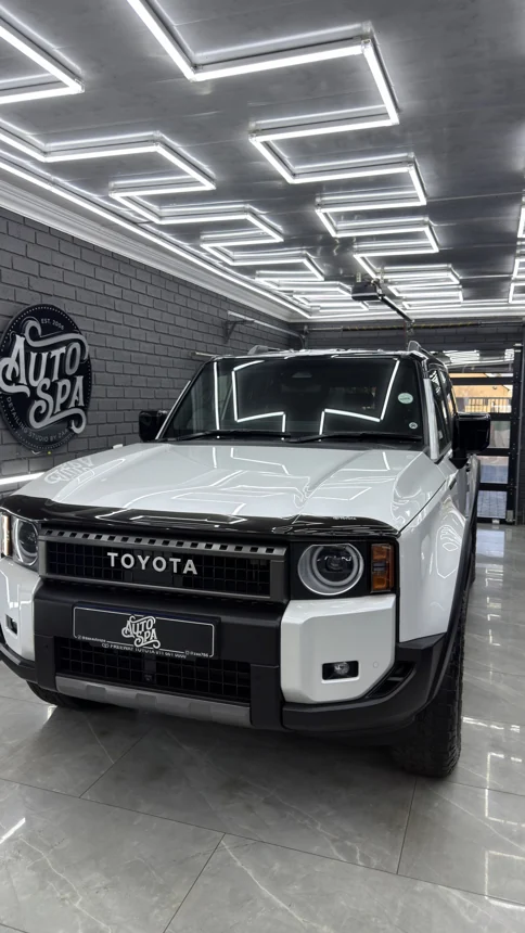 White Toyota Land Cruiser in the Auto Spa studio