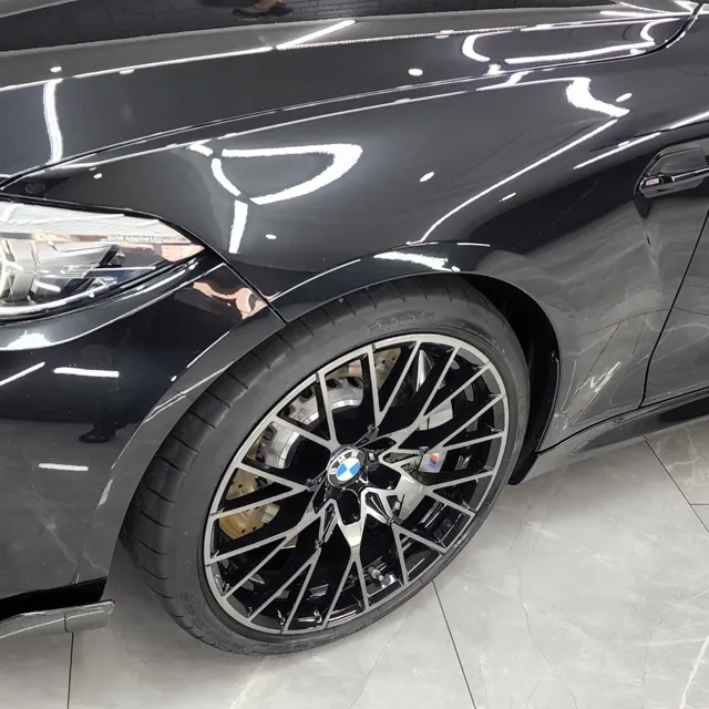 Close-up of a BMW alloy wheel and bodywork